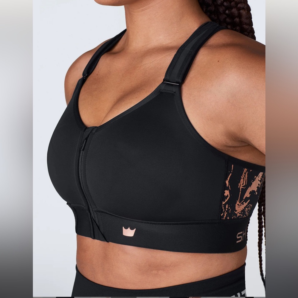 SHEFIT Black Sports Bra with Rose Gold Accents